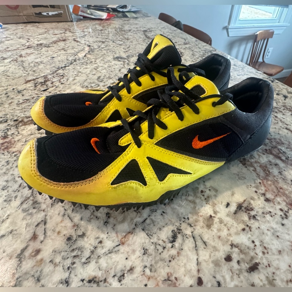 NIKE TRACK AND FIELD MENS SIZE 11.5 BLACK AND YELLOW, with spikes